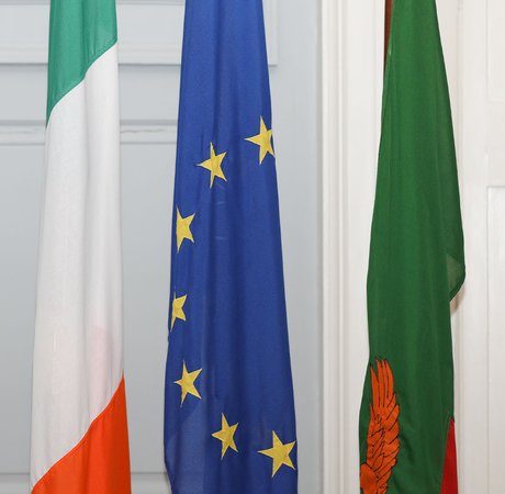 Irish, EU, and Zambian national flags
