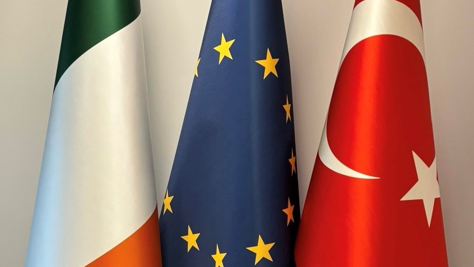 Irish, EU and Turkish flags together.