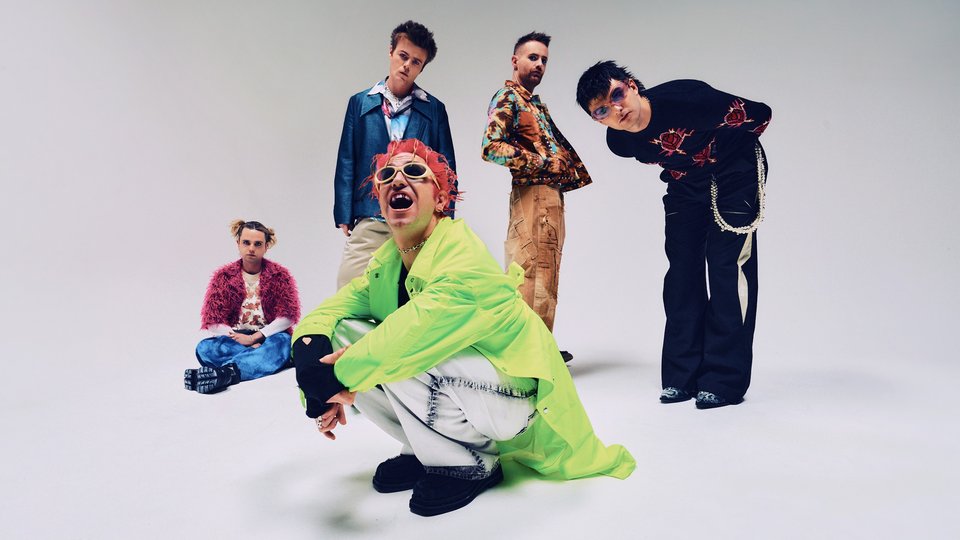 Fontaines DC photoshoot on a white studio background.