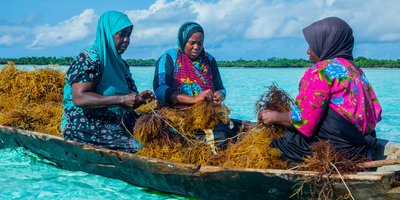 Three women in a boat in Tanzania