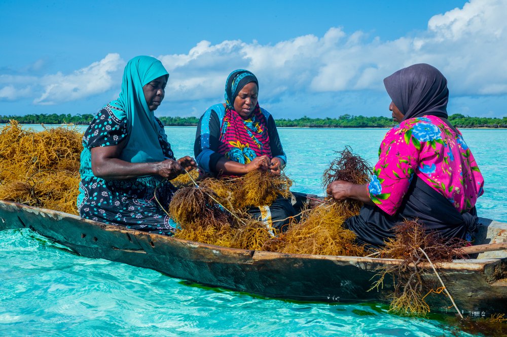 Three women in a boat in Tanzania