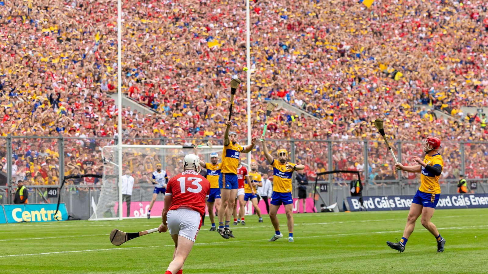 Players celebrating after Cork’s Patrick Horgan scores a free in hurling final