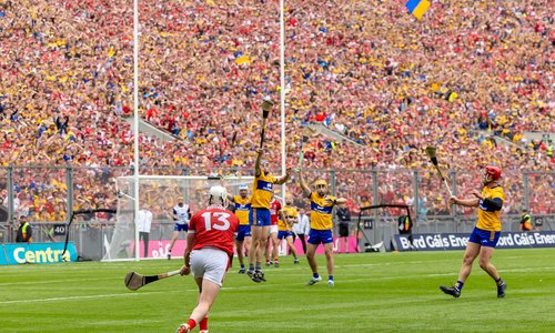 Players celebrating after Cork’s Patrick Horgan scores a free in hurling final