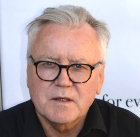 Gerry looking at the camera with a neutral expression