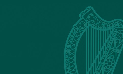 Government of Ireland harp outline on green background.