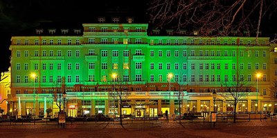 The Embassy building lit up in green lights for St Patrick's Day.