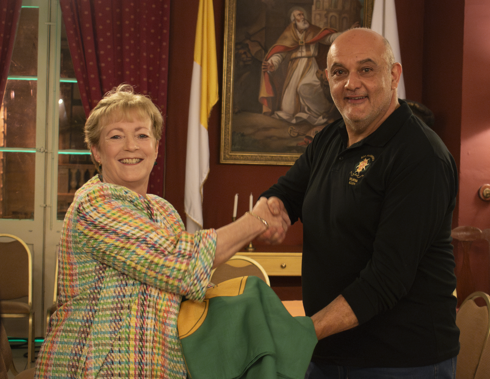 Ambassador Caroline Whelan shaking hands with the Vilhena President