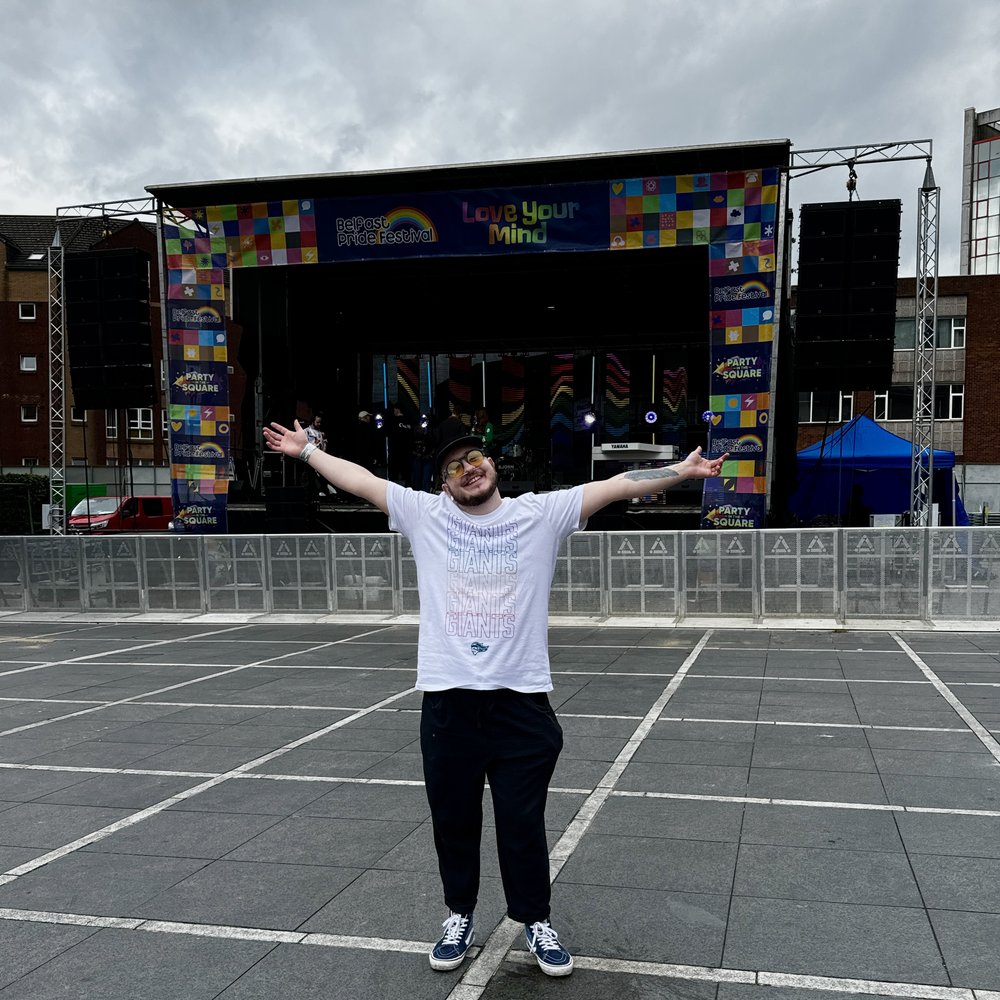 Person standing infront of a stage