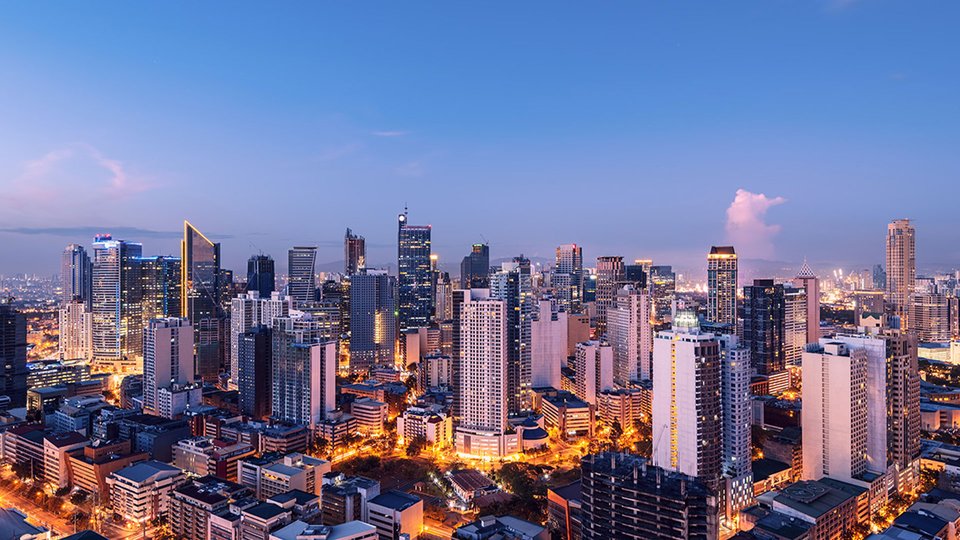 Skyline view of Manila lit up at night