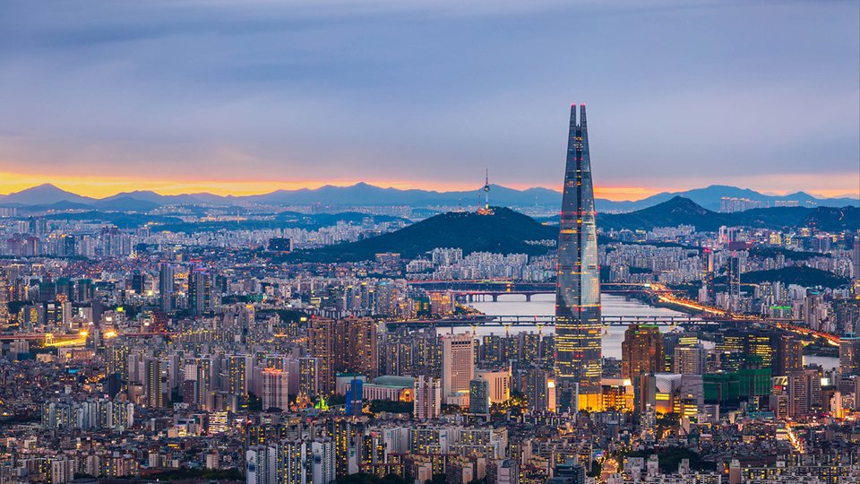 Skyline view of Seoul at dawn.