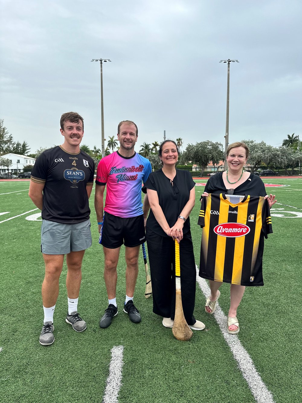 Vice Consul Dara Mac Gabhann, GAA legend, JJ Delaney, then Minister for Tourism, Culture, Arts, Gaeltacht, Sports and Media and Consul General Sarah Kavanagh at the GAA Showcase in 2024