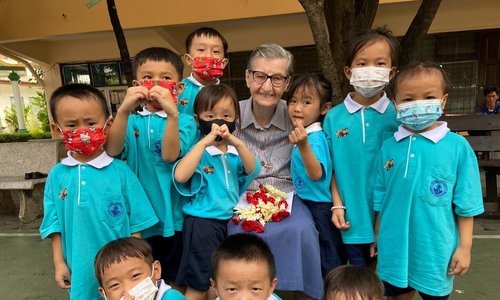 Sister Louise Horgan with school children