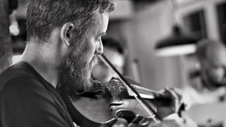 Man playing the fiddle