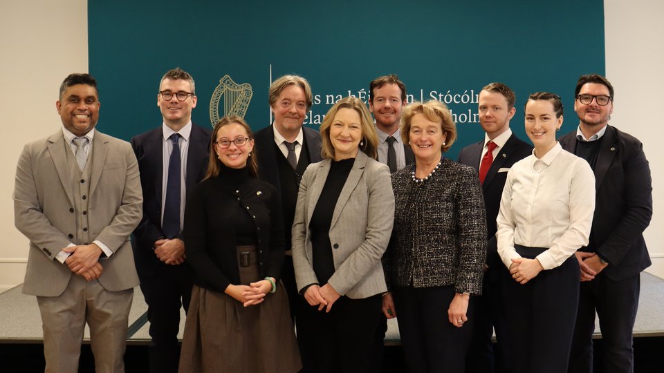 Formal group photo of Ireland House staff