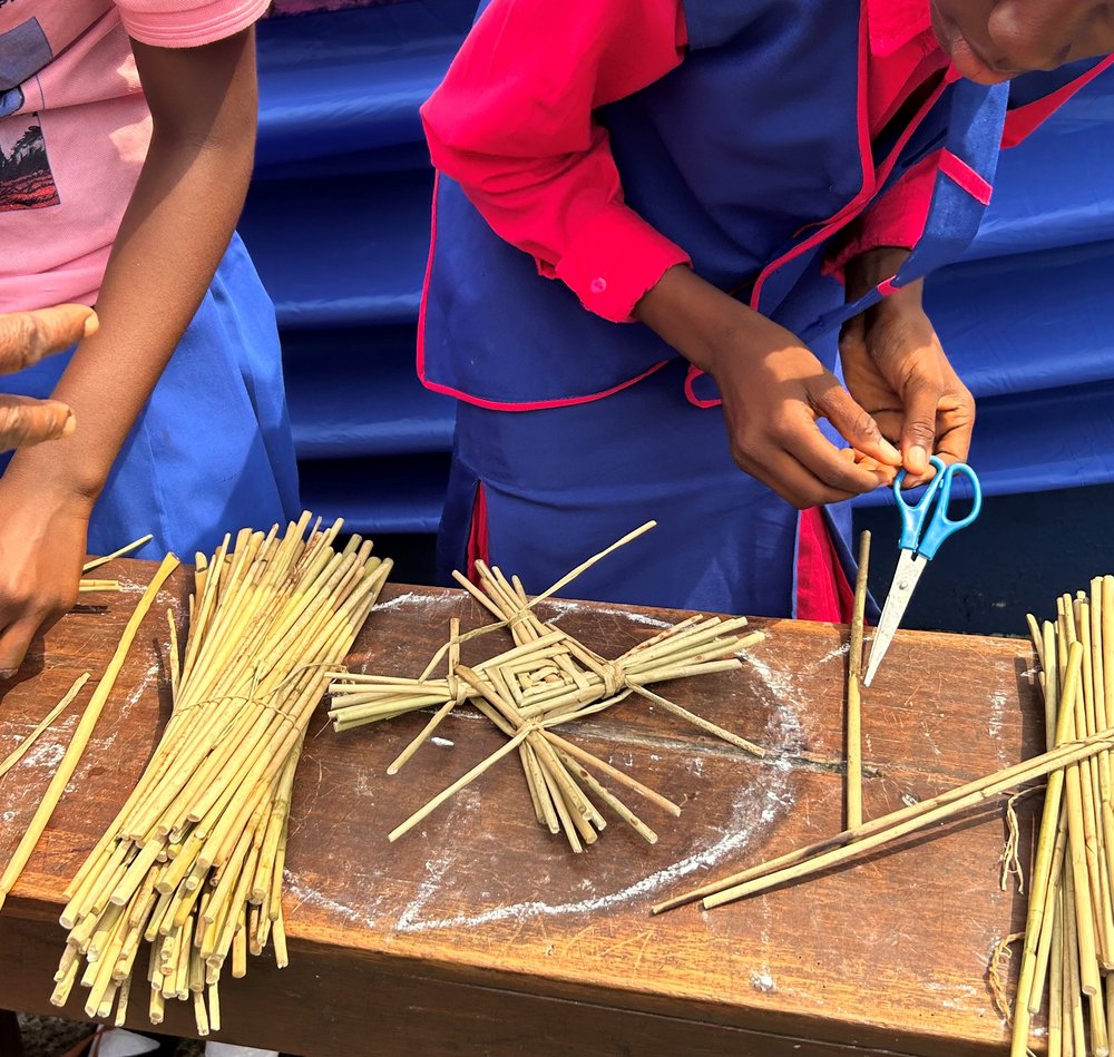 Children making St Brigids cross