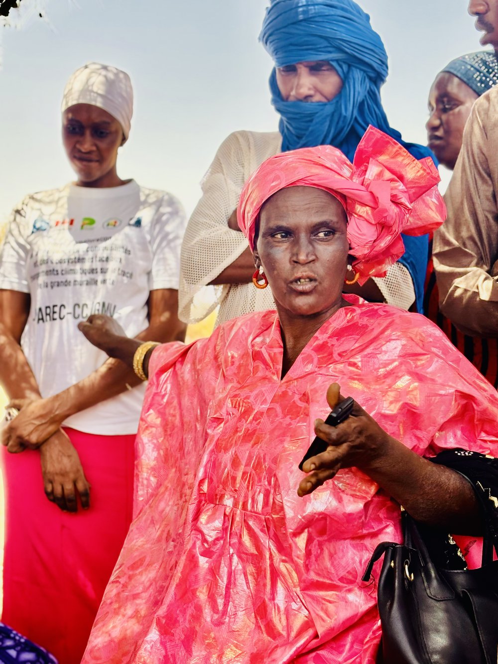 Woman in a pink dress.