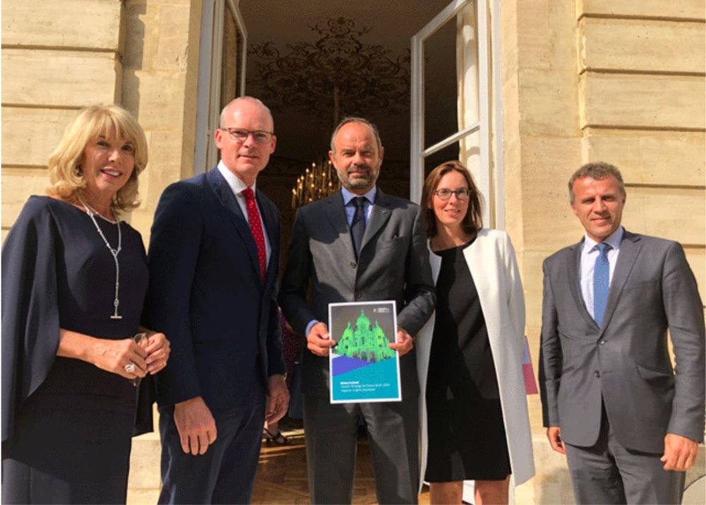 Simon Coveney and embassy staff launching the Global Ireland Strategy for France to 2025