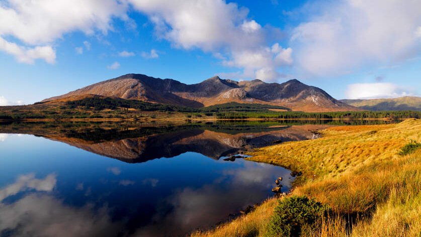 View across a lake of a mountain