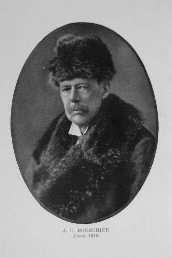 Vintage sepia photograph of a man with a large fluffy coat and hat