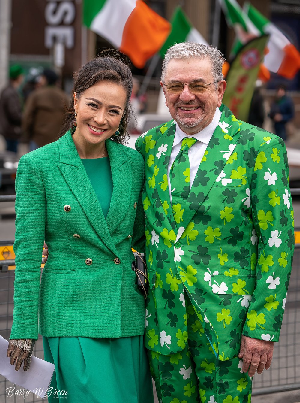Jennifer Hsiung co-anchor on CP24 Breakfast Television and Hugo Straney at St Patricks Day wearing  green suits
