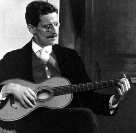 James Joyce playing a guitar