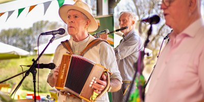 People singing and playing traditional Irish music