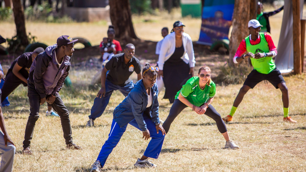 Participants working out in a fitness workshop in Kibera
