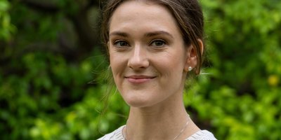 Headshot of Marie Claire Hughes