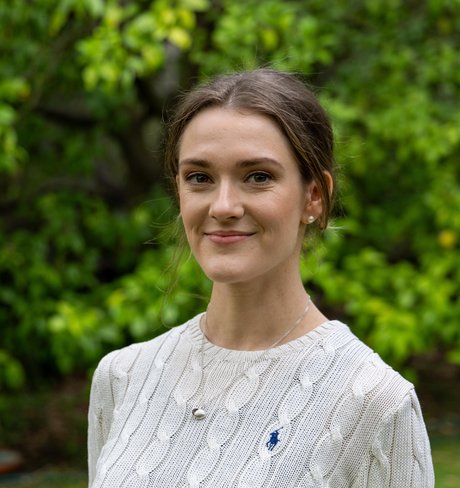 Headshot of Marie Claire Hughes
