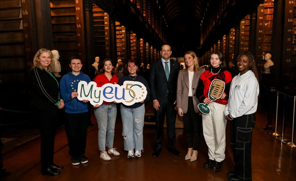 Taoiseach Leo Varadkar, European Parliament President Metsola, EMI President Noelle O'Connell and TCD Students launch MyEU50 Competition in the long room in Trinity, standing together holding a MYEU50 sign
