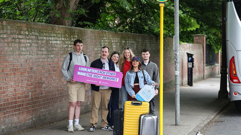 Make the right memories campaign image with young people waiting for a bus to the airport