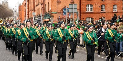 marching band in red uniforms