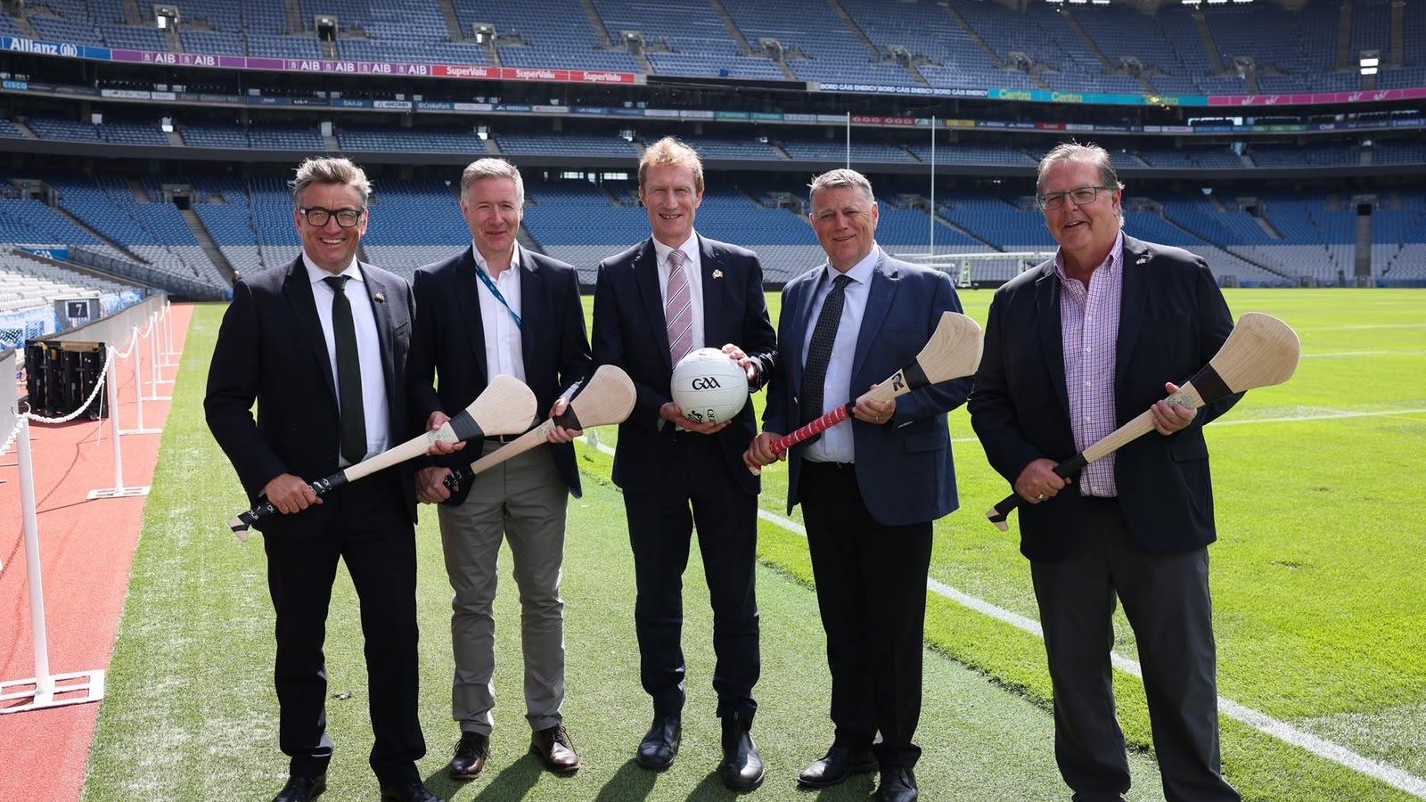 Meeting GAA in Croke Park holding hurls
