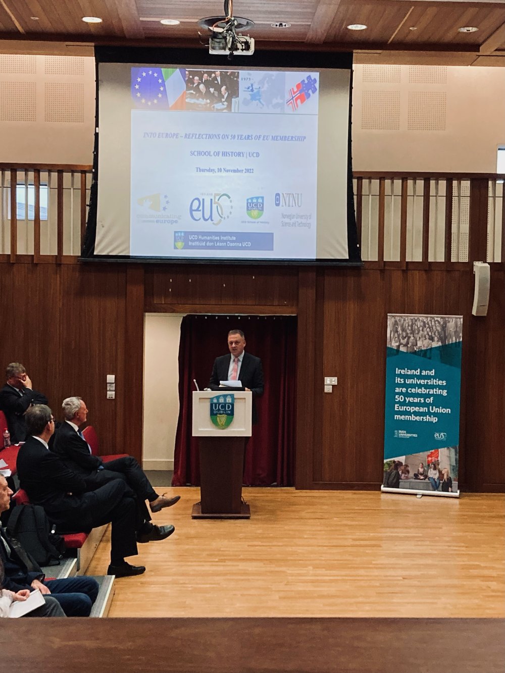 Minister of State Thomas Byrne TD speaking at the podium.