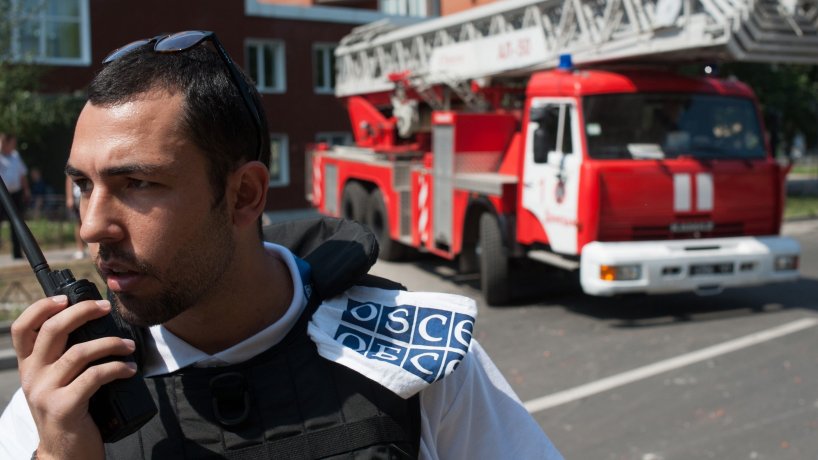 OSCE Employee working in the field