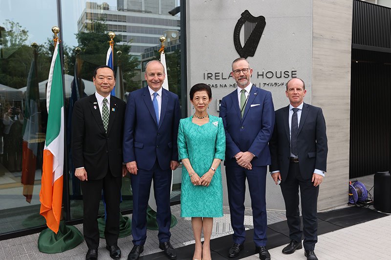 four men and one woman standing at the entrance of Ireland House Tokyo
