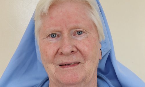 Sr Mary Kileen in front of a white background