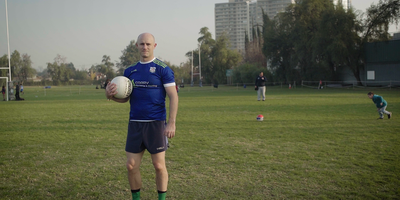 Paddy Coary holding a gaelic football