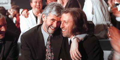 Irish singers Charlie McGettigan and Paul Harrington hug each other after winning the Eurovision in Dublin.