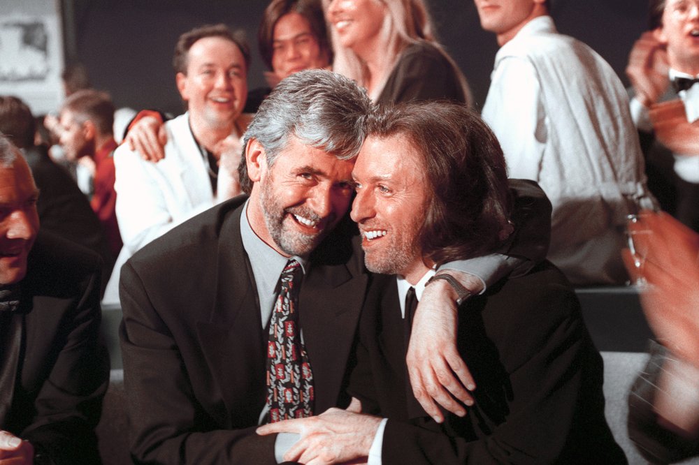 Irish singers Charlie McGettigan and Paul Harrington hug each other after winning the Eurovision in Dublin.