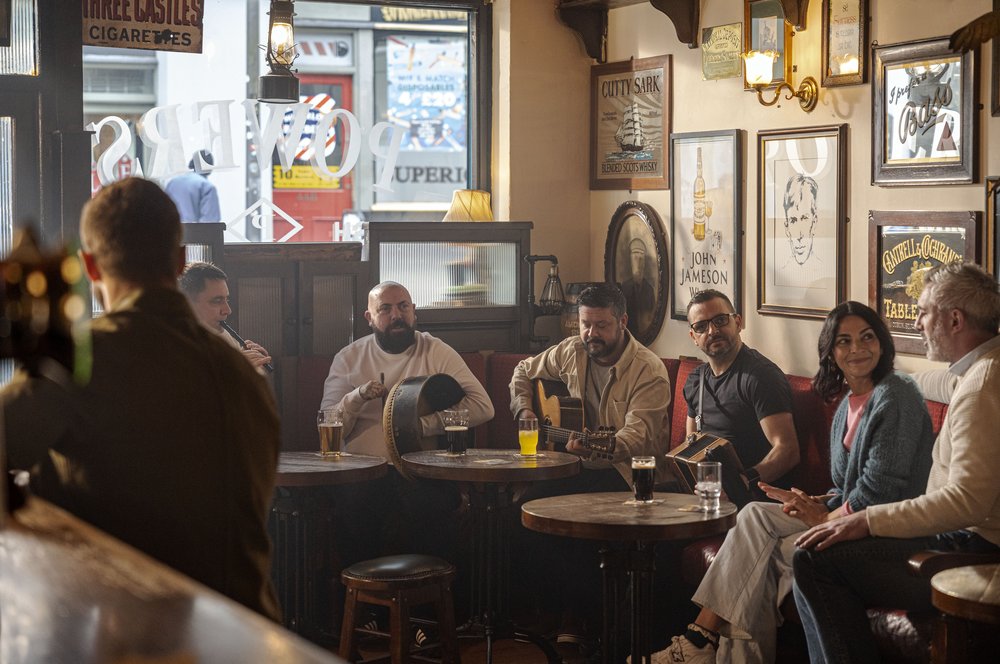 Irish traditional musicians playing in an Irish pub