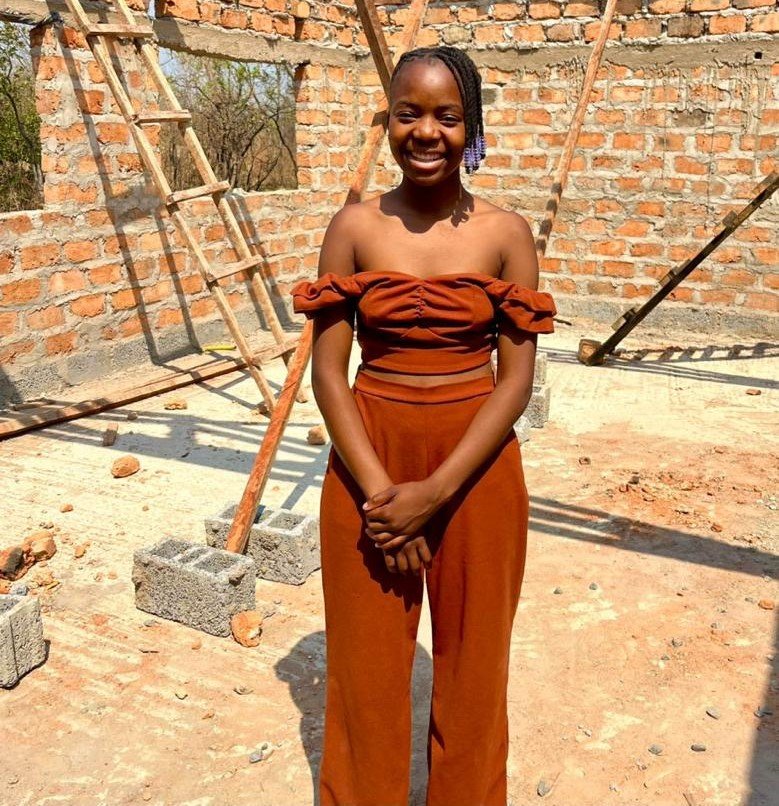 Peggy inspecting the Pendeni building works