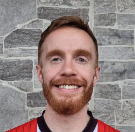 Headshot of Phil, smiling at the camera.