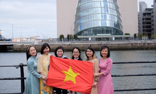 Group of students posing for a photo in front of the Convention Centre, Dublin