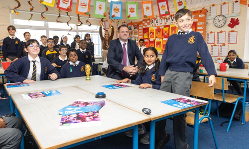 Neale Richmond with school pupils