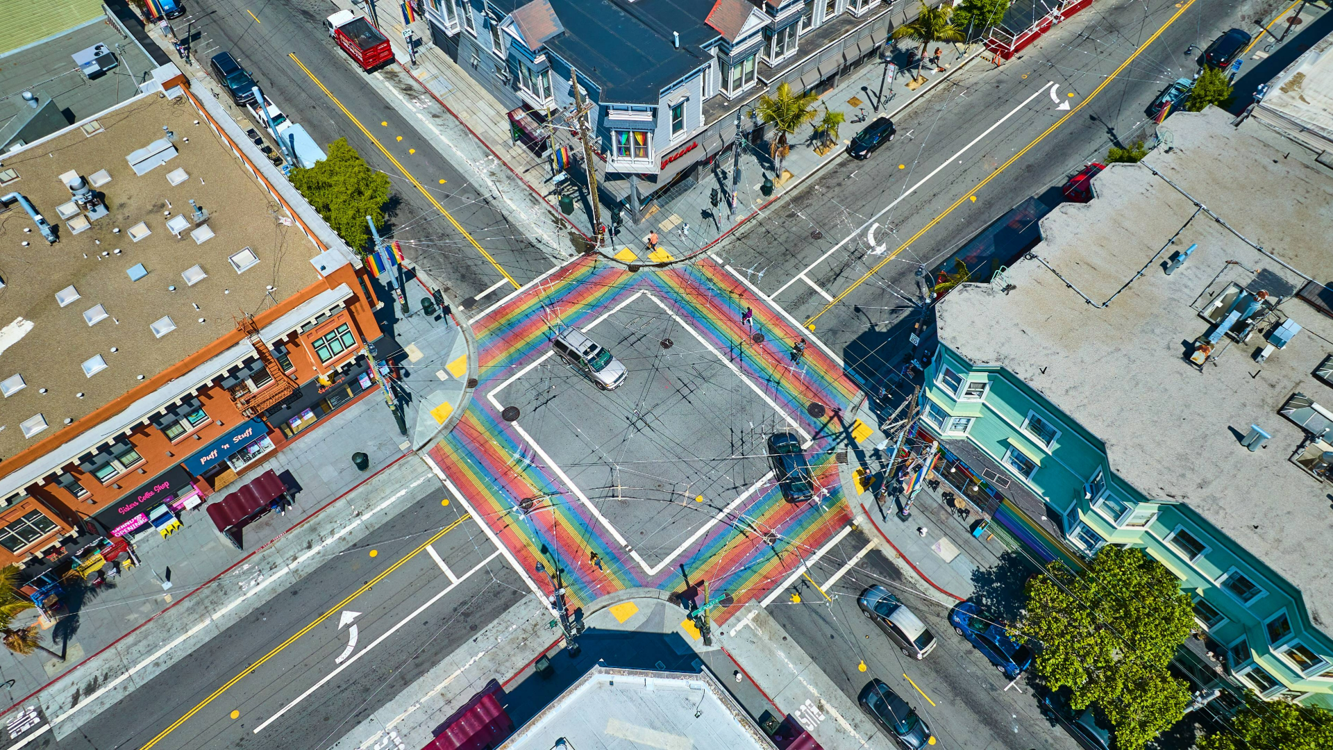 Rainbow crosswalks in Castro District aerial downward view with shops