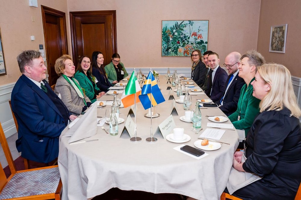Minister Higgins sits with Ambassador Barbara Jones, Deputy Head of Mission Conleth Brady and members of the Swedish Irish Parliamentary Friendship Group for Saint Patrick's Day lunch.