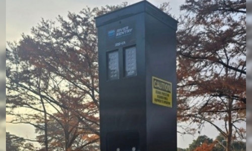 A river sentry (flood warning mechanism) machine, by a river in Texas