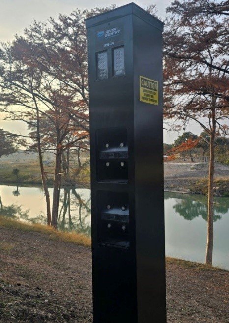 A river sentry (flood warning mechanism) machine, by a river in Texas