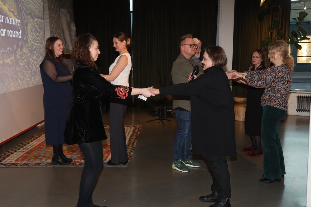 A group doing trust exercises